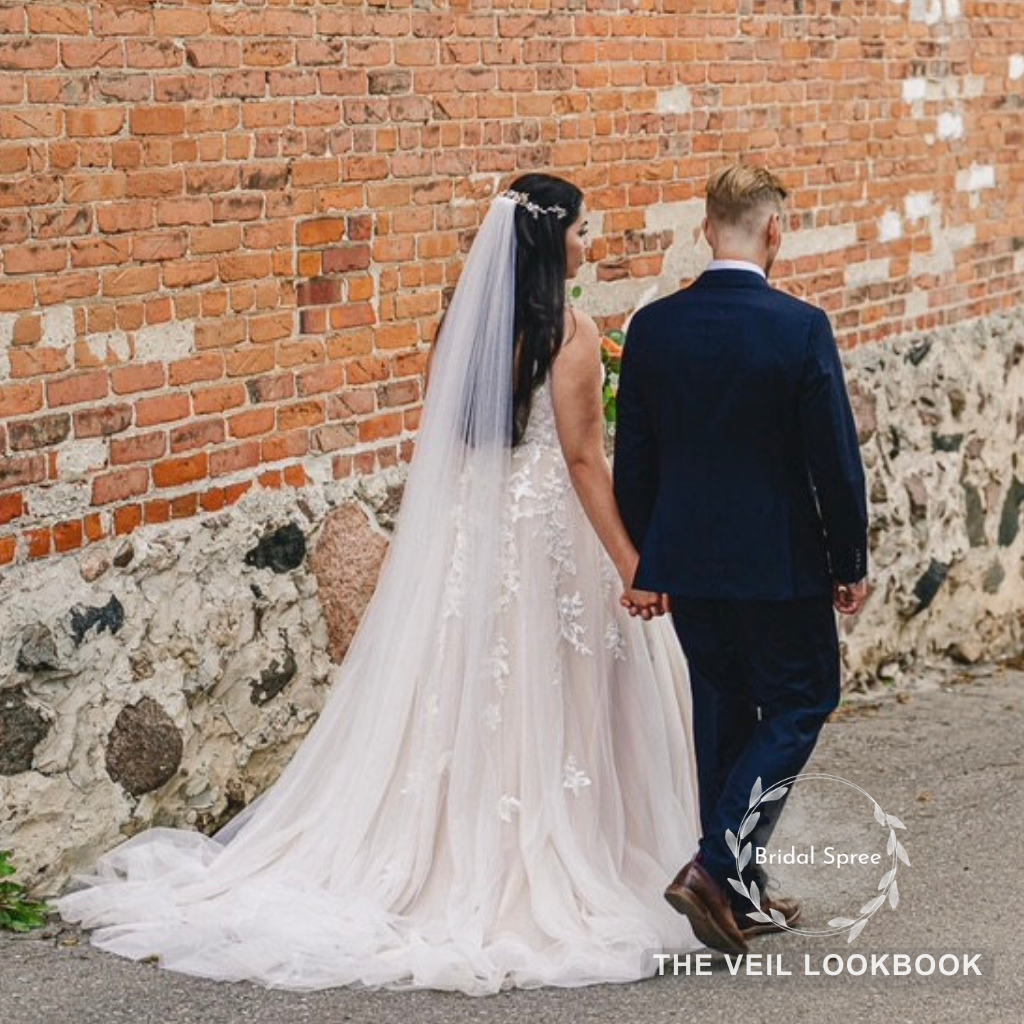 bride wearing short veil for outdoor wedding shoot