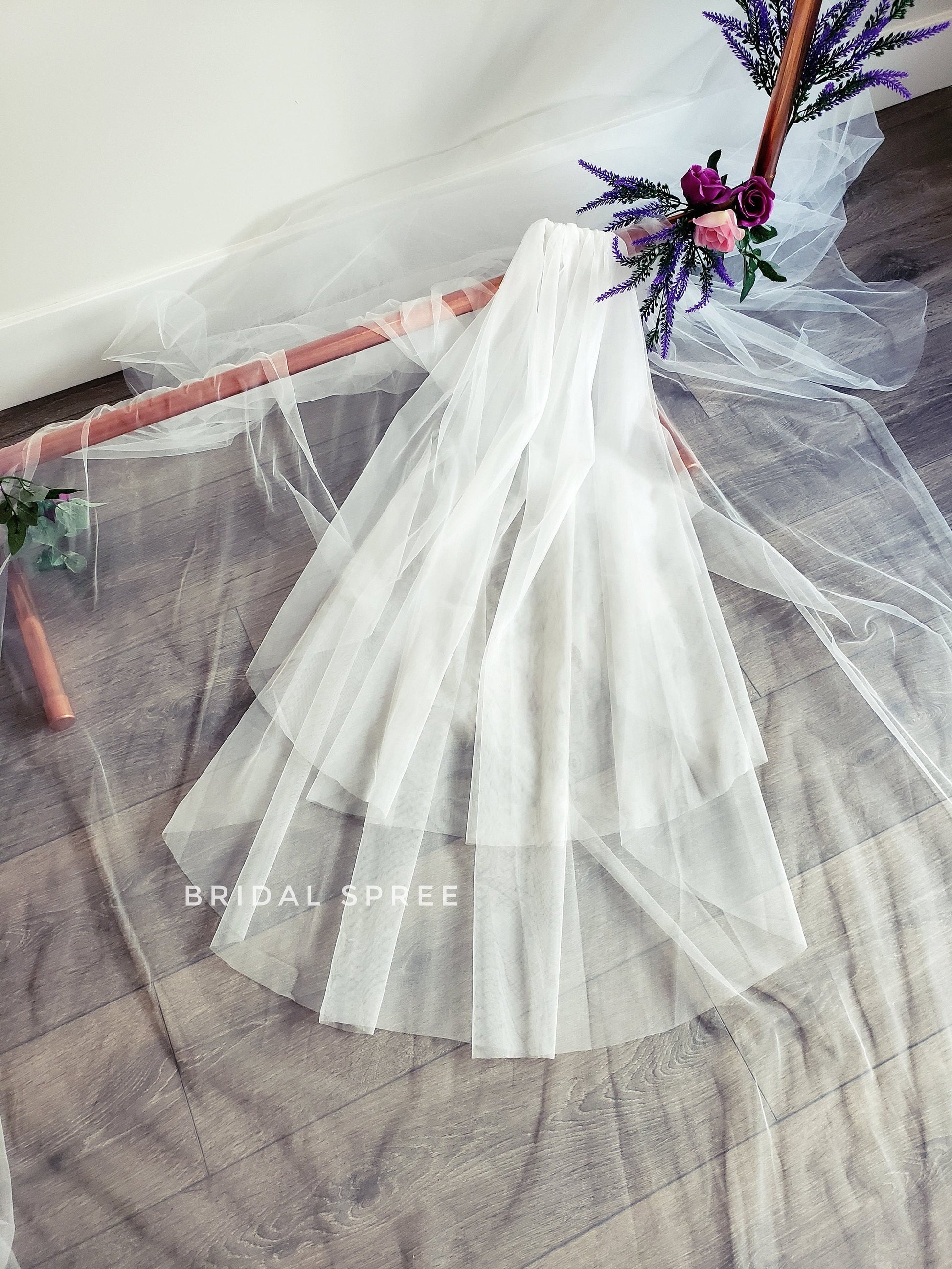 Bridal Spree's romantic two tier fingertip veil with blusher